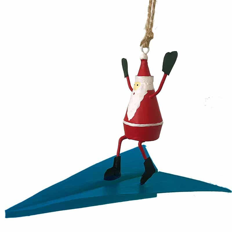 Babbo natale su aereoplano di carta blu
